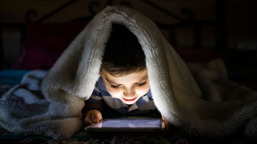 Blue light before bed prevents a young body from winding down.